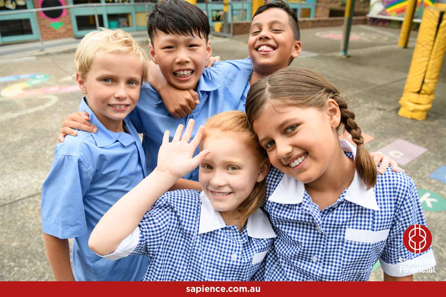 happy primary school children waving at camera